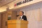 定期総会で挨拶する内城会長